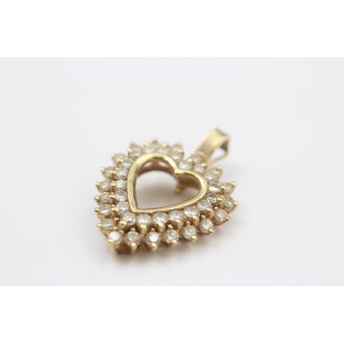 110 - 14ct Gold Diamond Heart Pendant (5.4g)