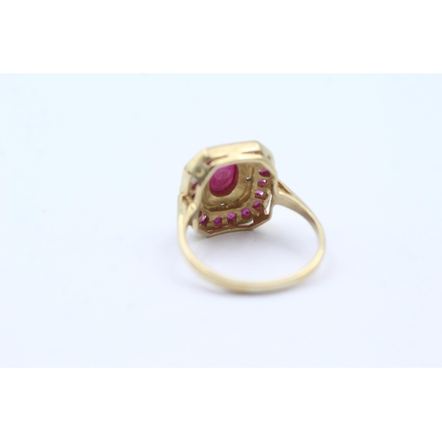 112 - 9ct Gold Diamond & Ruby Dress Ring (2.6g) size  J