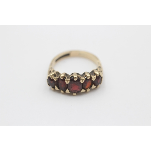 116 - 9ct Gold Garnet Five Stone Ring (4g) size  M