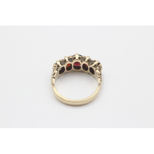 116 - 9ct Gold Garnet Five Stone Ring (4g) size  M