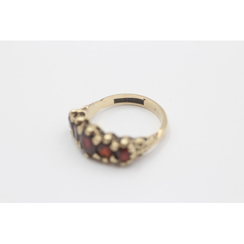 116 - 9ct Gold Garnet Five Stone Ring (4g) size  M