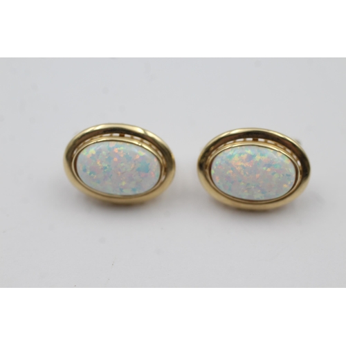 133 - 9ct Gold White Opal Stud Earrings (4.6g)