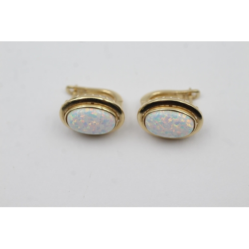 133 - 9ct Gold White Opal Stud Earrings (4.6g)