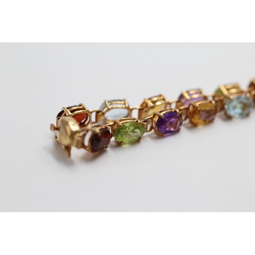 143 - 9ct Gold Multi-Gemstone Link Bracelet Inc. Garnet, Topaz, Citrine, Amethyst & Peridot (5.4g)