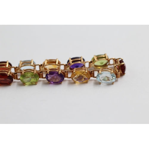 143 - 9ct Gold Multi-Gemstone Link Bracelet Inc. Garnet, Topaz, Citrine, Amethyst & Peridot (5.4g)