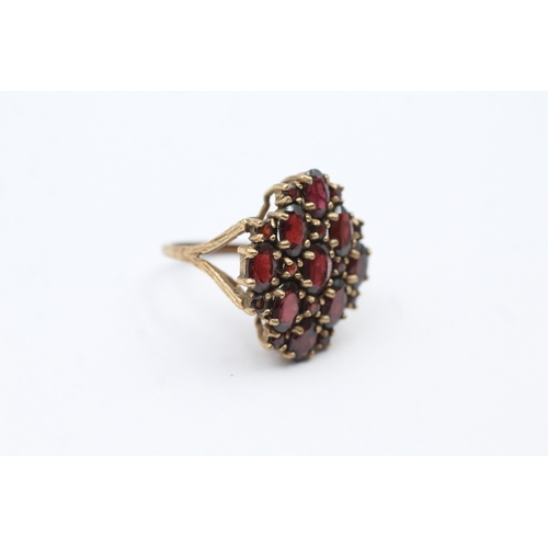 146 - 9ct Gold Garnet Dress Ring (5.7g) size  L+1/2