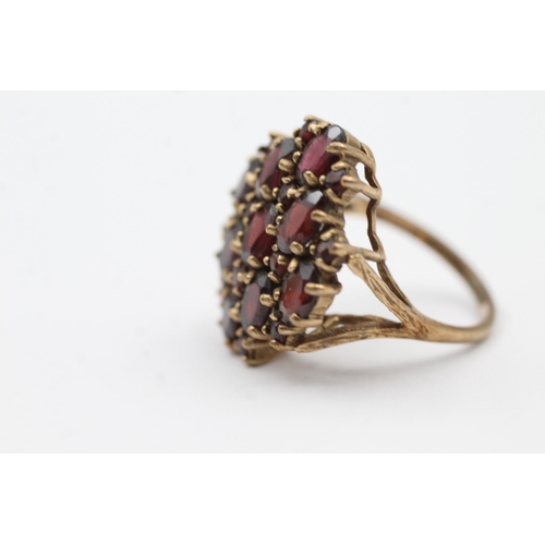 146 - 9ct Gold Garnet Dress Ring (5.7g) size  L+1/2