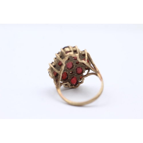 146 - 9ct Gold Garnet Dress Ring (5.7g) size  L+1/2