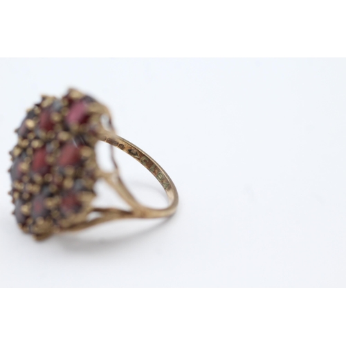 146 - 9ct Gold Garnet Dress Ring (5.7g) size  L+1/2