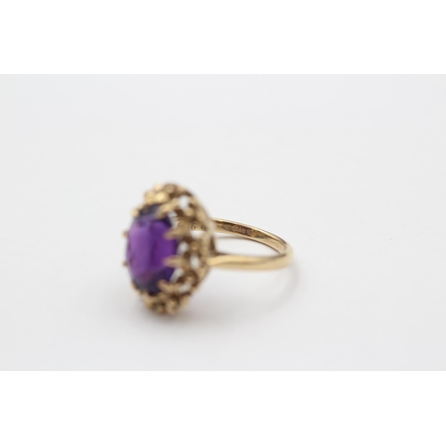 149 - 9ct Gold Amethyst Single Stone Ring With Floral Frame (3.7g) size  J