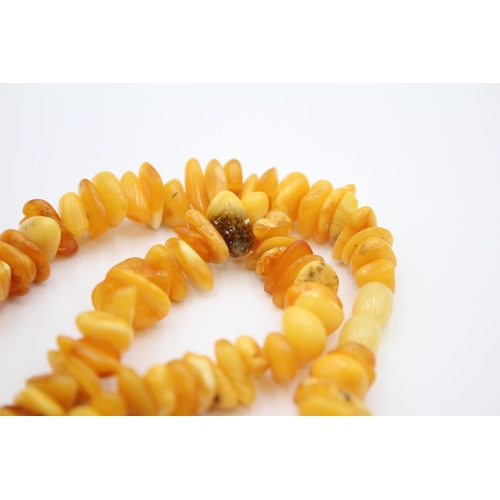 169 - A Butterscotch Amber Nugget Necklace And A Bracelet (63g)