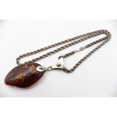 176 - A Modernist Silver Statement Amber Pendant Necklace (49g)