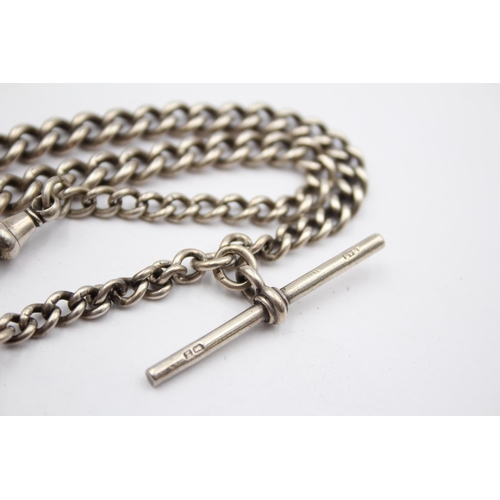 179 - A Silver Watch Chain With Coin Fob (44g)