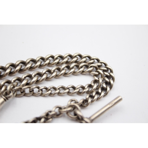 179 - A Silver Watch Chain With Coin Fob (44g)