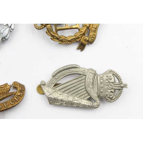 193 - 12x Military cap badges  inc. DLI Hampshire, Cheshire Etc.