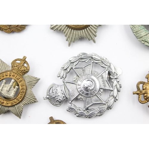 193 - 12x Military cap badges  inc. DLI Hampshire, Cheshire Etc.