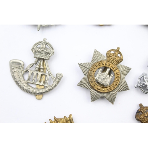 193 - 12x Military cap badges  inc. DLI Hampshire, Cheshire Etc.