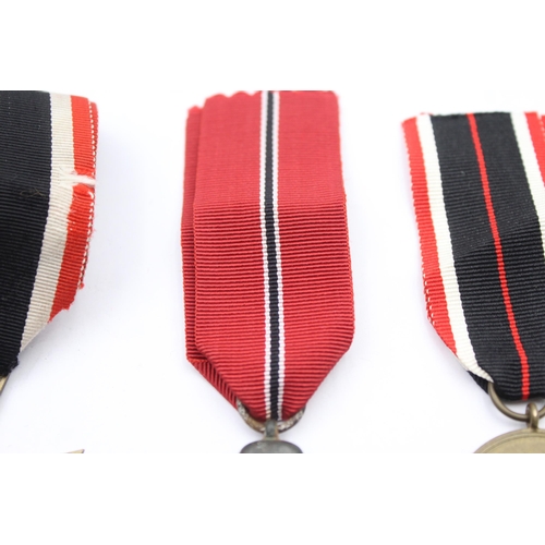 202 - 3x German WWII medals including Merit Cross, Merit Medal and Eastern Front Medal.