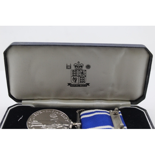 210 - 2x Police Long Service Medals including boxed ERII named Const. Peter J Vincent GVI Inspector David ... 