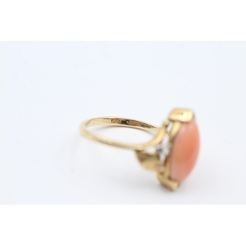 54 - 14ct Gold Pink Coral Single Stone Ring With Diamond Sides (3.1g) size  M