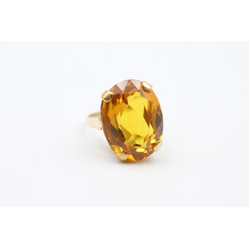 66 - 9ct Gold Yellow Synthetic Sappire Single Stone Cocktail Ring (8.4g) size  Q