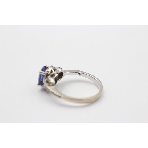 81 - 14ct White Gold Tanzanite Single Stone Ring With Diamond Surrounds & Shank (3.1g) size  M