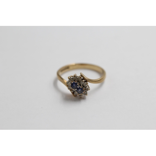 115 - 9ct Gold Diamond & Sapphire Dress Ring (2g) size M