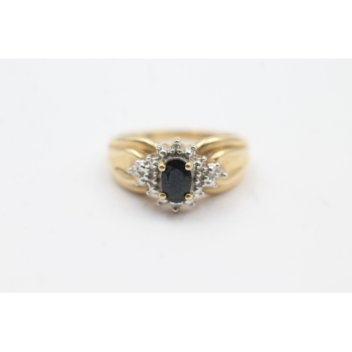 117 - 9ct Gold Sapphire Single Stone Ring With Diamond Surround (3.2g)