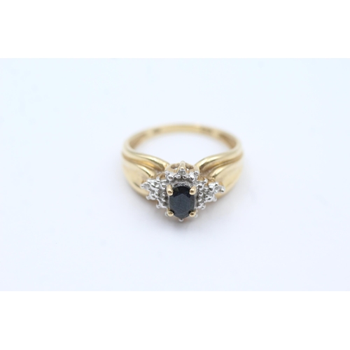 117 - 9ct Gold Sapphire Single Stone Ring With Diamond Surround (3.2g)