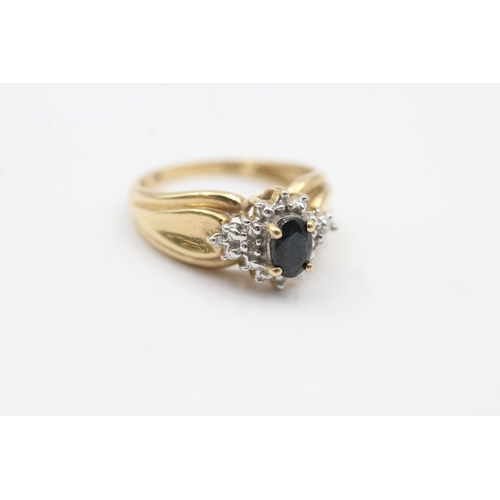 117 - 9ct Gold Sapphire Single Stone Ring With Diamond Surround (3.2g)