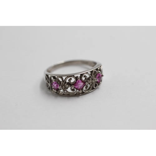 128 - 9ct White Gold Diamond & Pink Sapphire Openwork Dress Ring (2.1g) size L