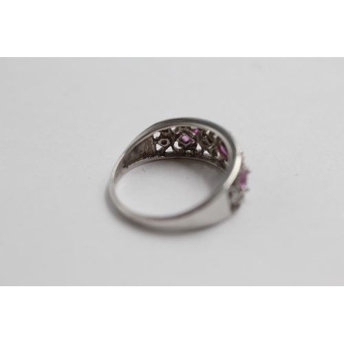 128 - 9ct White Gold Diamond & Pink Sapphire Openwork Dress Ring (2.1g) size L