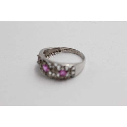 128 - 9ct White Gold Diamond & Pink Sapphire Openwork Dress Ring (2.1g) size L