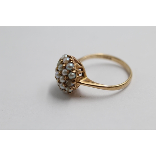 131 - 9ct Gold Seed Pearl Halo Ring (2.7g) size I