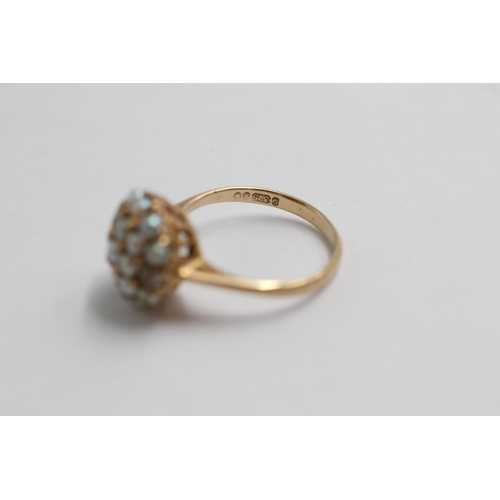 131 - 9ct Gold Seed Pearl Halo Ring (2.7g) size I