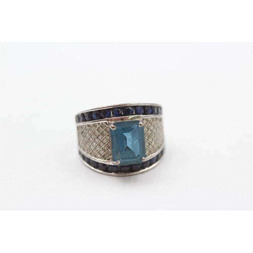 17 - 9ct White Gold Blue Topaz Single Stone Ring With Diamond & Sapphire Set Shank (6g) size J