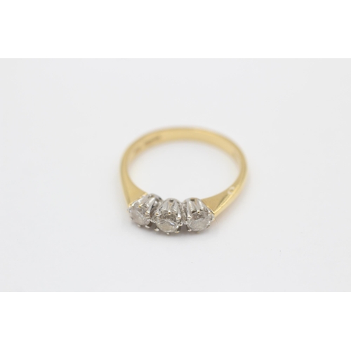 77 - 18ct Gold Round Cut Diamond Three Stone Ring (3.1g) size M