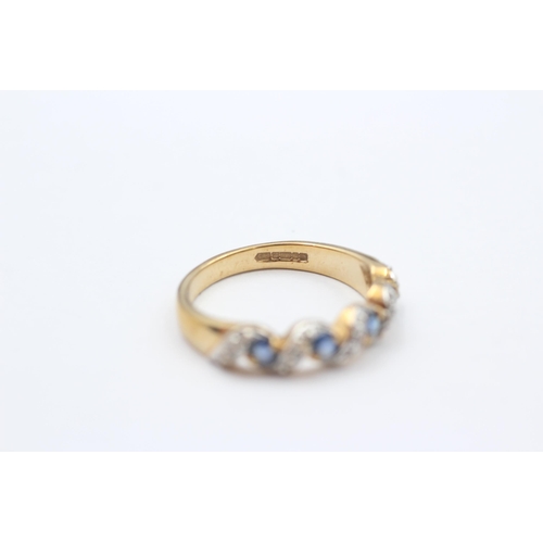 83 - 9ct Gold Sapphire Five Stone Ring With Diamond Spacers (2.8g) size O