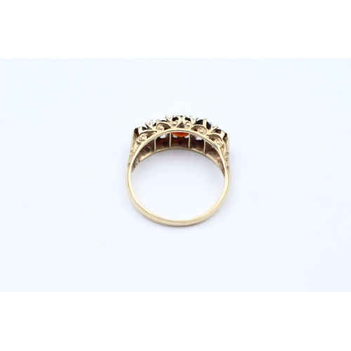 96 - 9ct Gold Garnet Five Stone Ring (3.1g) size P