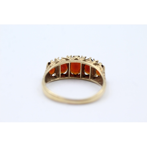 96 - 9ct Gold Garnet Five Stone Ring (3.1g) size P