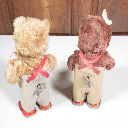 288 - 2x mechanical tin plate teddy bears reading books - both running  7