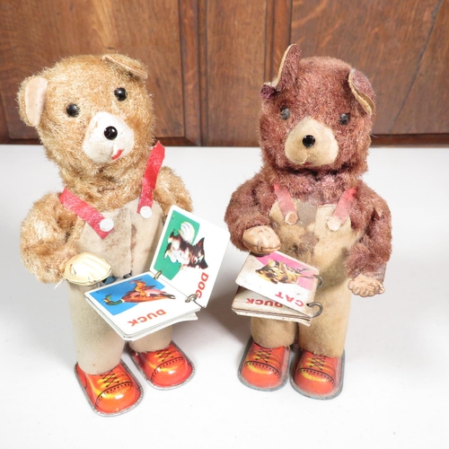 288 - 2x mechanical tin plate teddy bears reading books - both running  7