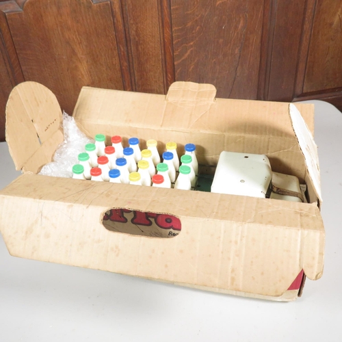 293 - Boxed TriAng milk cart with bottles