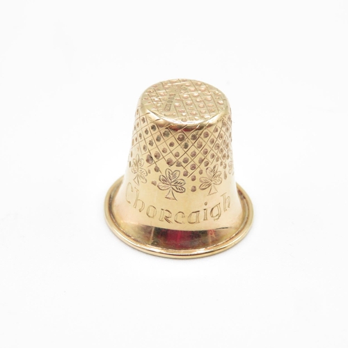 296 - 9ct gold thimble and case fully HM  thimble weighs 5.6g