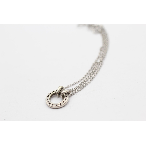 119 - 9ct White Gold Diamond Paved Circle Frame Connector Double Chain Bracelet (2.6g)