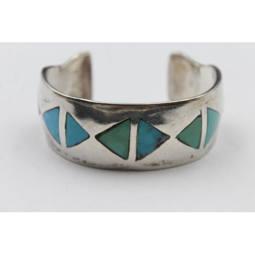 159 - A Silver Turquoise Set Native American Artist Signed Bangle (87g)