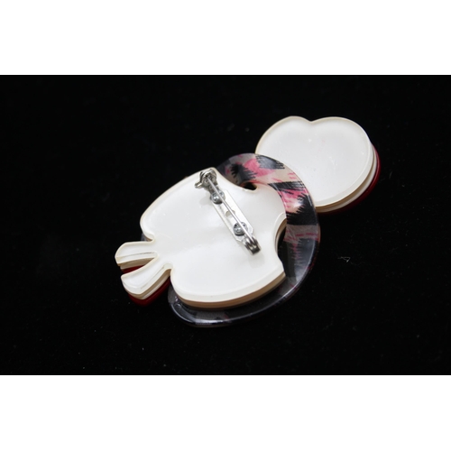 169 - Four Novelty Acrylic Brooches (54g)