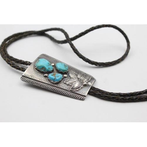 185 - A Silver Turquoise Set Bolo Tie By Zuni Artist Jose Calavaza (66g)