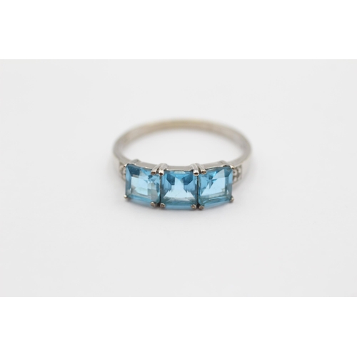 30 - 9ct White Gold Blue Topaz & Diamond Trilogy Dress Ring (2.3g) size Q1/2