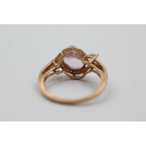 64 - 9ct Gold Pink Gemstone & Diamond Twist Setting Dress Ring (3g) size N1/2